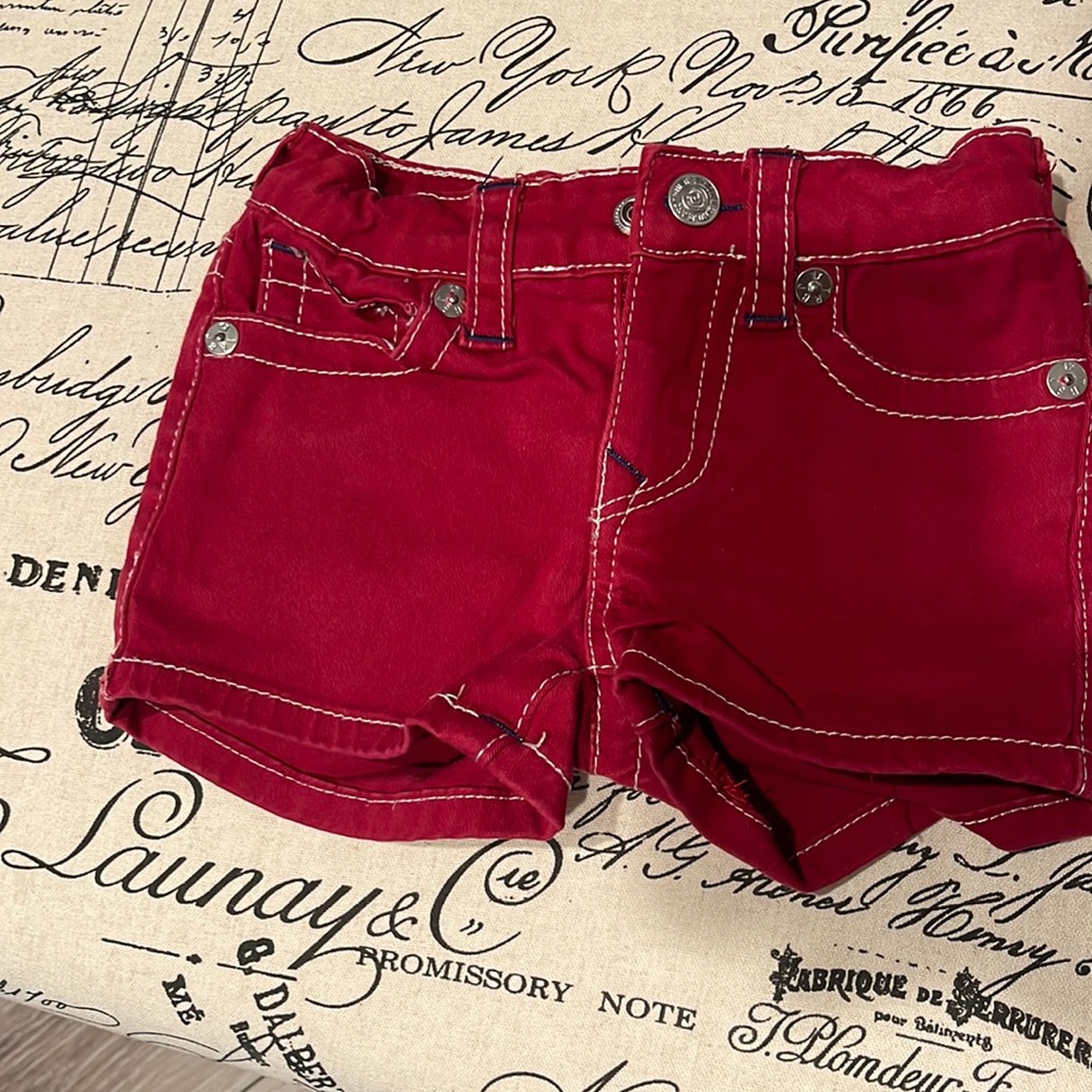 True Religion red girls shorts size toddler 4. Cut-off short. Adjustable waist.